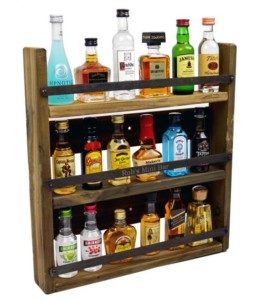 3 Tier Shelf of Small Liquor Bottles Varying in Brand