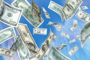 Numerous Dollar Bills with blue background(sky)