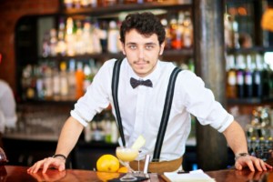 Bartender Standing Ready for Orders Facing User
