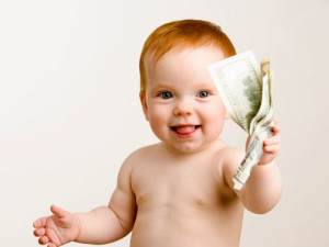 Baby holding money