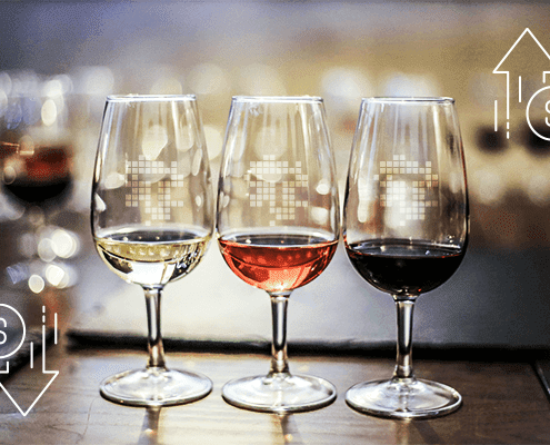 3 Glasses of wine varying kinds on black table, blurred background