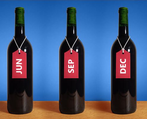 3 Wine Bottles Labeled: JUN, SEP, DEC with blue background