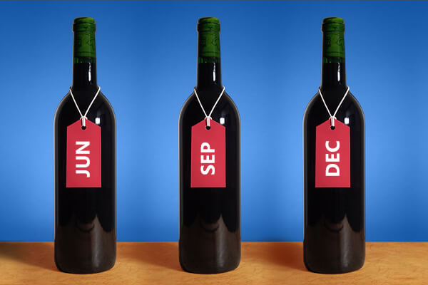 3 Wine Bottles Labeled: JUN, SEP, DEC with blue background