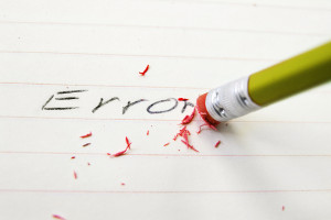 Pencil Eraser wiping away the word Error